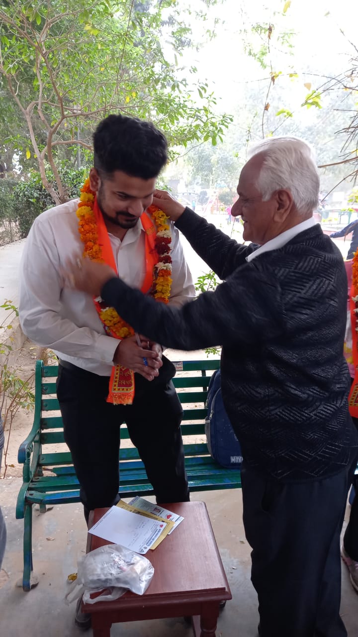 Honoured for service at a community medical camp