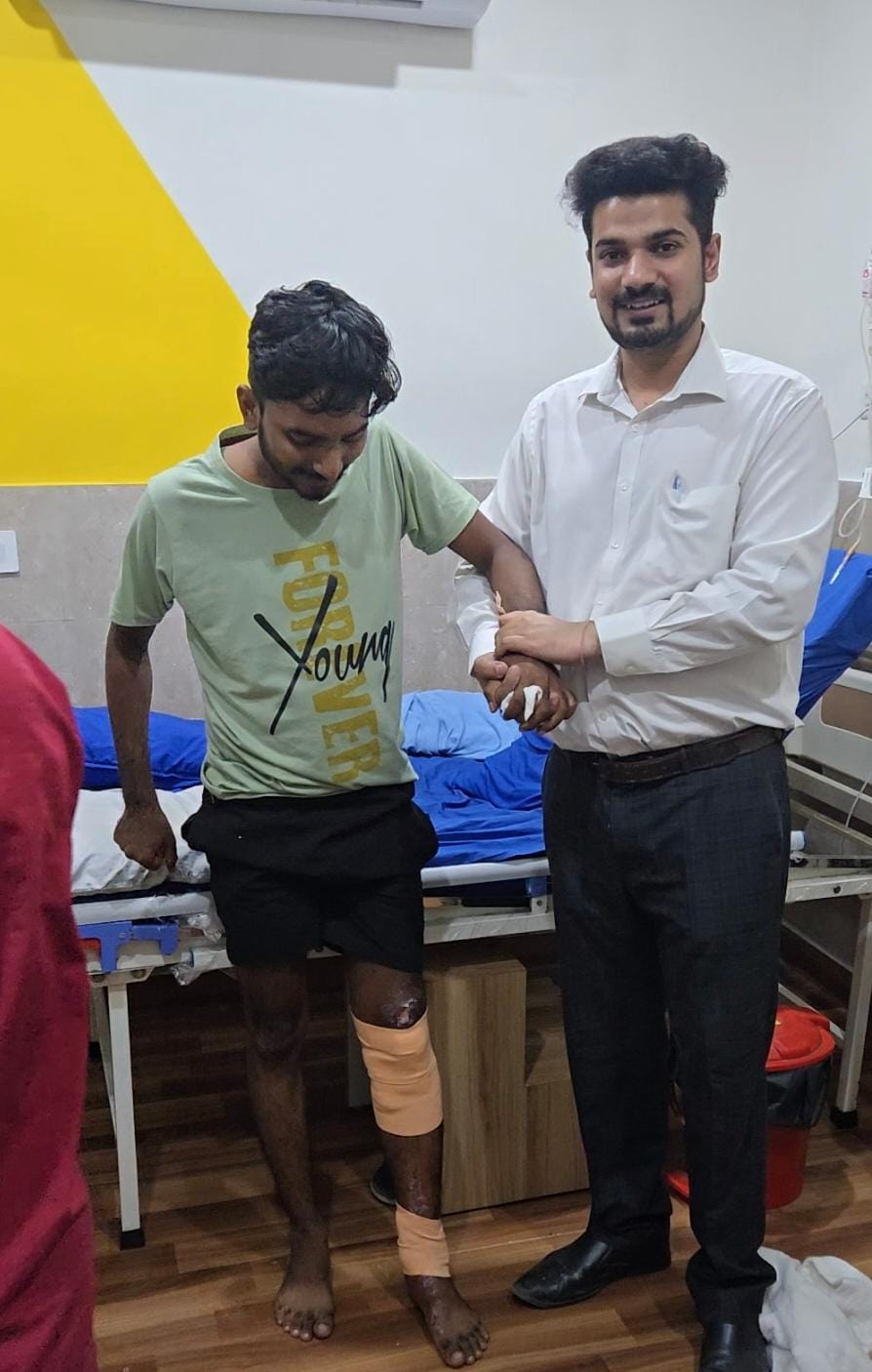 Dr. Shivam Rampal with a patient on the road to recovery